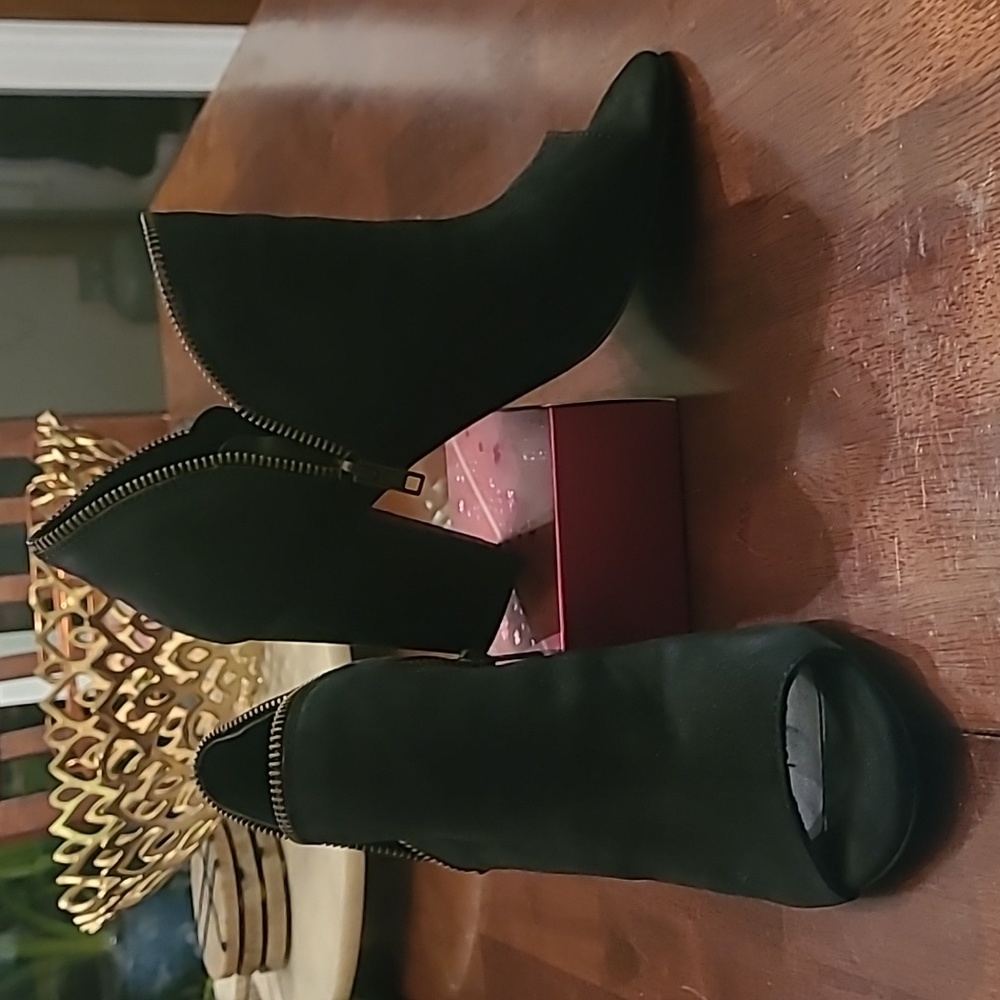 Black suede toe less, double zipper booties.